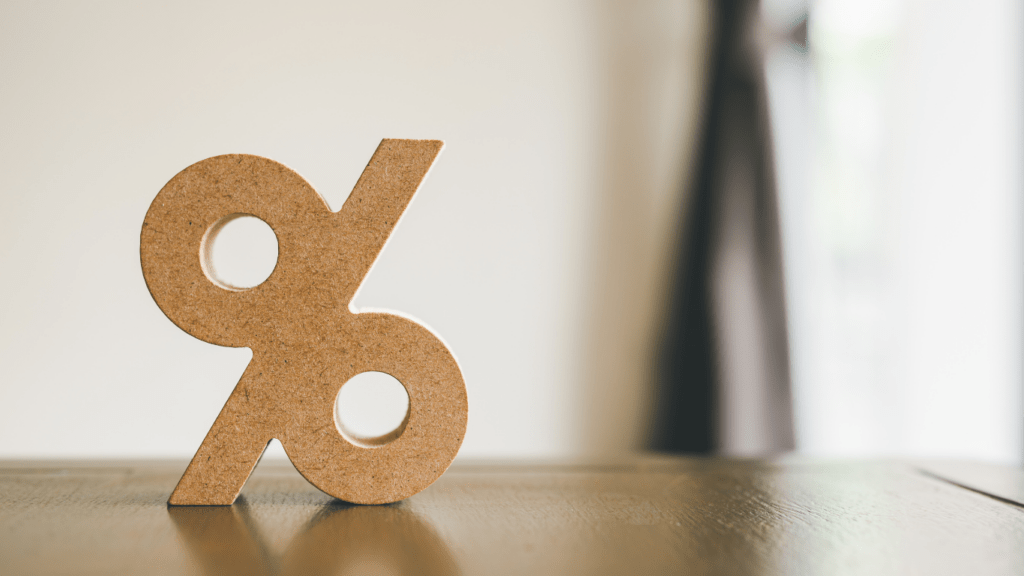 percentage sign on wooden table