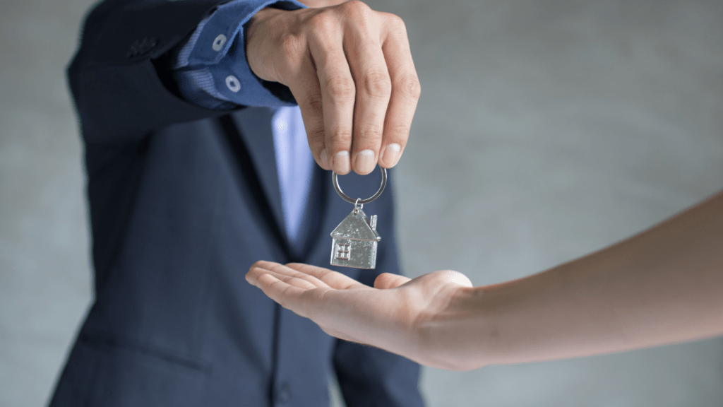 a person holding a sold key